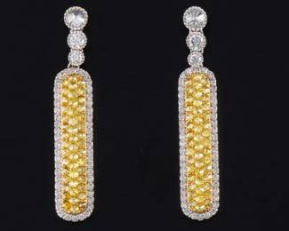 A Pair of Fancy Yellow and White Diamond Earrings 