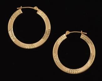 A Pair of Gold Hoop Earrings 