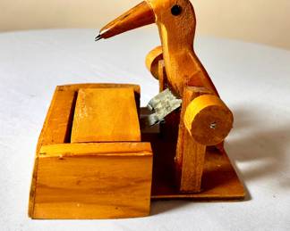 Wooden bird cigarette/toothpick dispenser