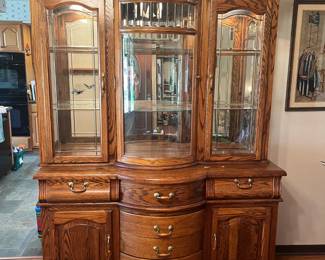 Lighted Bowfront China Cabinet by "Winners Only".  Excellent Condition and so beautiful! Measures 59 x 24 x 76. 