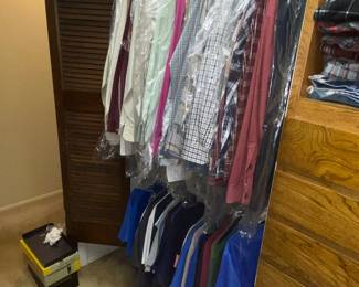 Men’s clothing- many pieces right from the dry cleaners