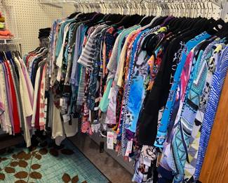 Another packed closet of ladies fashions - so many with tags!