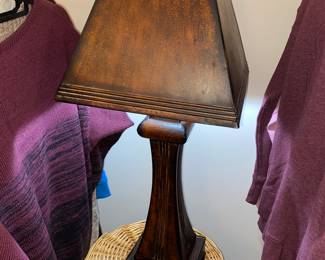 Metal lamp and wicker laundry basket