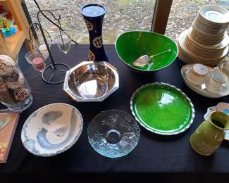 Decorative home items and green enamel on metal serving pieces