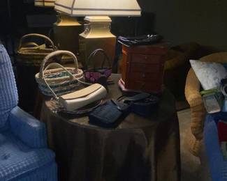 Glass top table with brass Asian inspired lamp and small jewelry box