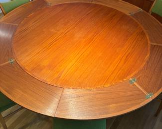 DRYLUND ROUND TEAK “LOTUS” OR “FLIP FLAP” DINING TABLE W/HIDDEN LEAVES