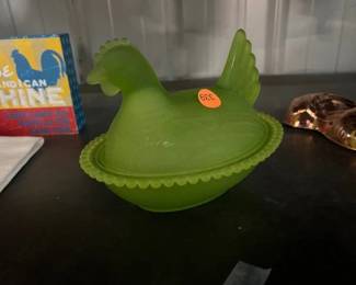 GREEN HEN ON NEST
