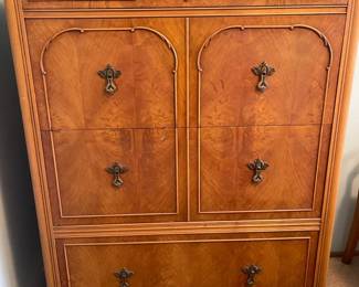 Tall Blonde Dresser With Carved Wood Detail