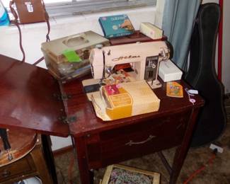 ATLAS SEWING MACHINE IN CABINET AND LOST OF VINTAGE NOTIONS