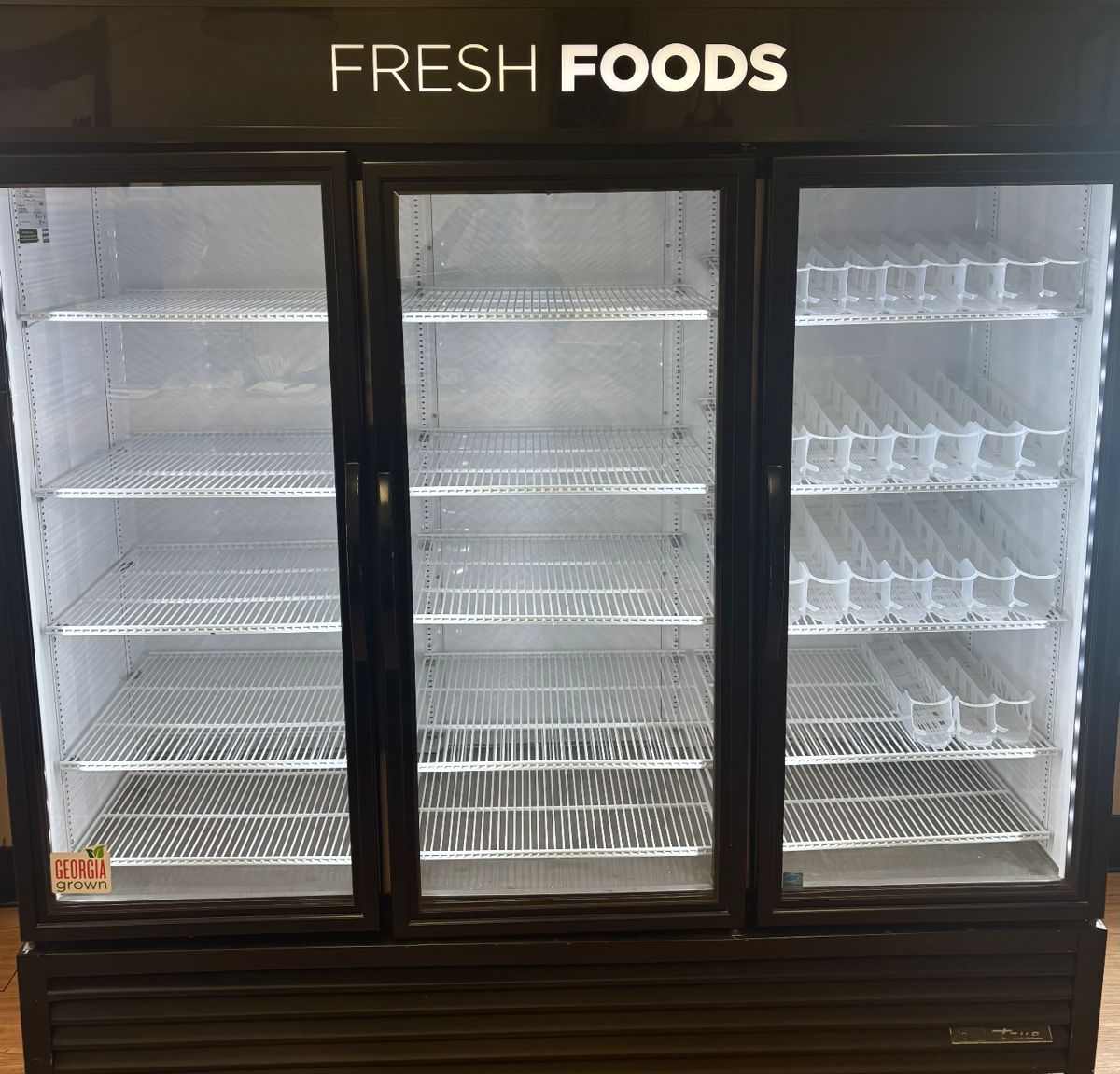 1of 2 photos : True 3 door glass refrigerator case . Includes drink holders as seen in photos. 
Measurements: W 78 x D 30 x H 77 
Quantity: 1
