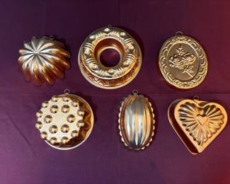 Copper Colored Baking Pans Wall Decor