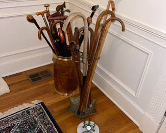 Umbrella stand with vintage umbrellas