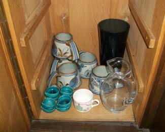 Pottery mugs, Glass Pitcher, Glass Vase.