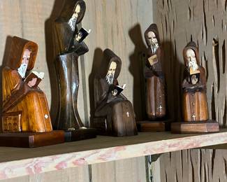 Old hand carved monks 