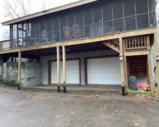 Large screened in porch over 
Garage entrance. 