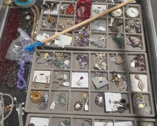 Lots of contemporary silver jew e lry, jade and red tiger eye beads, and more. 