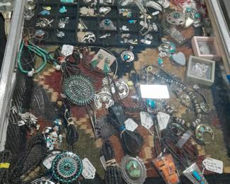 Beautiful bolos, turquoise beads, great BEAR pins and pendants, and more. 