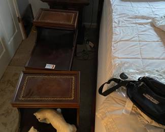 Pair of leather top end tables.