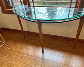 Glass toped half moon table