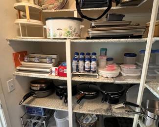 Our kitchen pantry is filled with pots and pans and so many baking supplies 