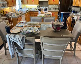 This dinning set comes with 6 chairs and 2 leafs to make it that much bigger!
