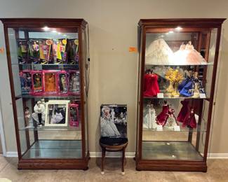 Our HUGE Barbie collection begins inside these two matching HOWARD MILLER display cases!