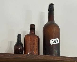 THREE VINTAGE BOTTLES