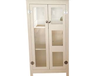 Modern white storage cabinet. Approximately 40-48" in height. Available for pre-sale starting Wed/Feb 19. Call or text 931-996-2642 for pricing and details on or after the 19th.
