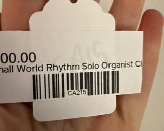 Small World Rhythm Solo Organist Clock