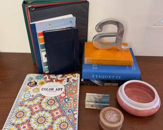 School supplies (binders, notebooks), brand new coloring book, ceramic business card holder for desk, various non-fiction books and decor 