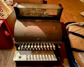 Antique National cash register. Marble piece is broken