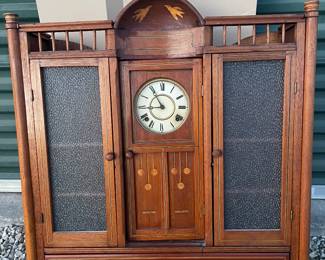 ANTIQUE CLOCK IN CABINET