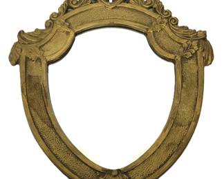 unique petite brass shield mirror 