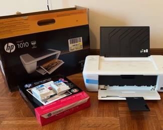 HP Deskjet 1010 Featuring Ink And Paper