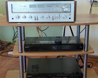 Pioneer Stereo Receiver, Sharp Bluray DVD Player, Sony Auto Player, Netgear Router  Stand 