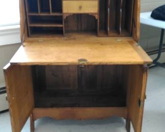 Inside the oak secretary