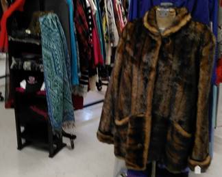 New and gently used women's fashion clothing, faux fur jackets, vests and coats.