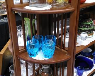 Mid Century Modern drink sets, blue glasses are fluorescent with black light.