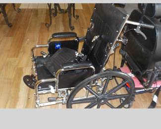 Medline Wheel Chair. (Note: Looks to be new-never used),  $150.00