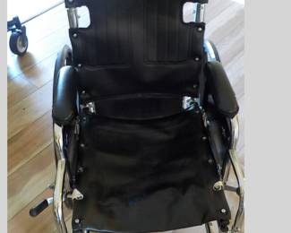 Medline Wheel Chair. (Note: Looks to be new-never used),  $150.00