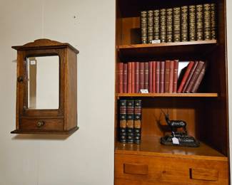 Small wall cabinet and some of the antique books