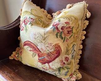Needlepoint pillow on 7' church pew.