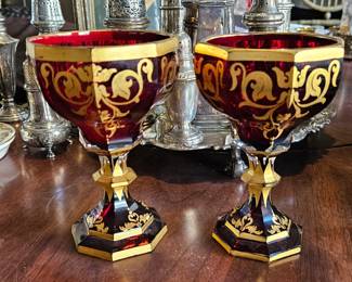 Pair of ruby coupes with 24k trim. 