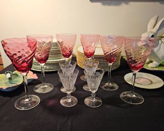 Optical Swirl cranberry stems from 1940s-1950s. Four of six crystal apertiffs shown