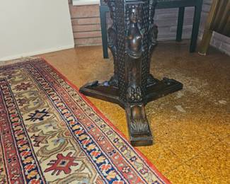 Mid-size table with three female figures forming the pedestal base.