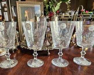 Four water glasses. Never used.