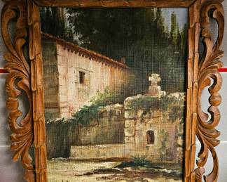 Village scene in antique frame.