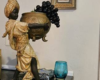 Cold painted bronze 24" Blackamore type figure holding a pot