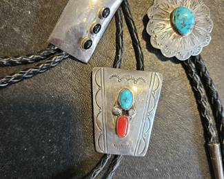 Sterling bolo ties on leather