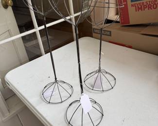 Three antique hat stands